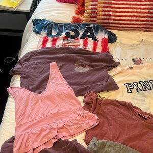 9 tshirts, one pink tank and a white long sleeve pacsun top